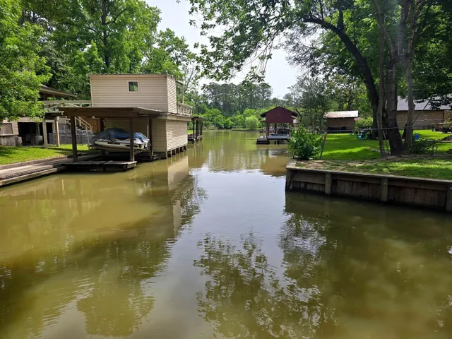 a house view with a lake view