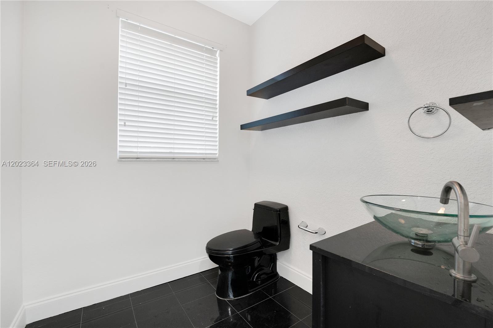 27433 Southwest 137th Court, Unit 1 Homestead, FL 33032 - Photo 19 of 28 a view of a workspace with a window