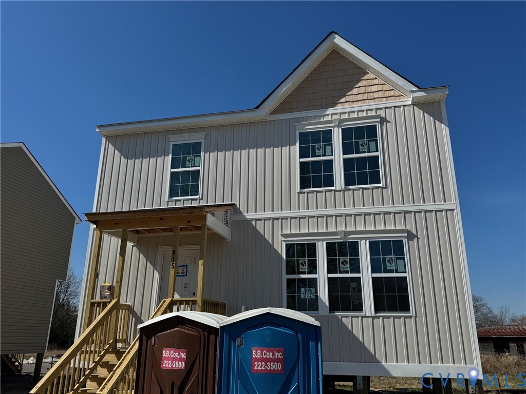 a front view of a house with glass windows