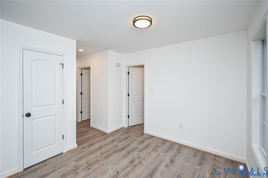 815 Kirby Street West Point, VA 23181 - Photo 11 of 29 a view of empty room with wooden floor