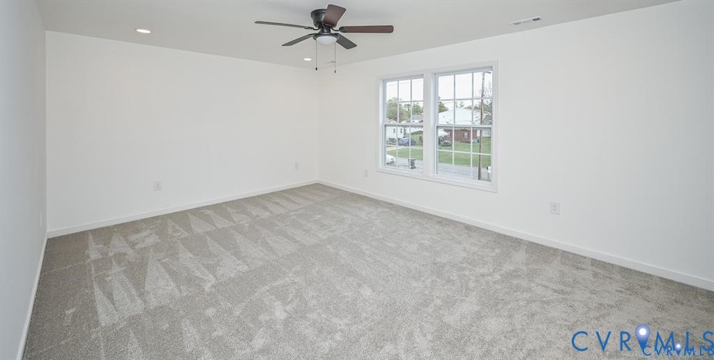 815 Kirby Street West Point, VA 23181 - Photo 16 of 29 an empty room with a window