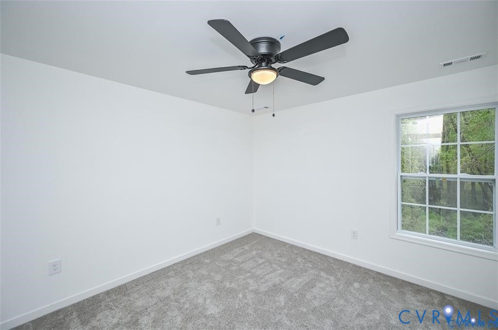 815 Kirby Street West Point, VA 23181 - Photo 18 of 29 an empty room with a window