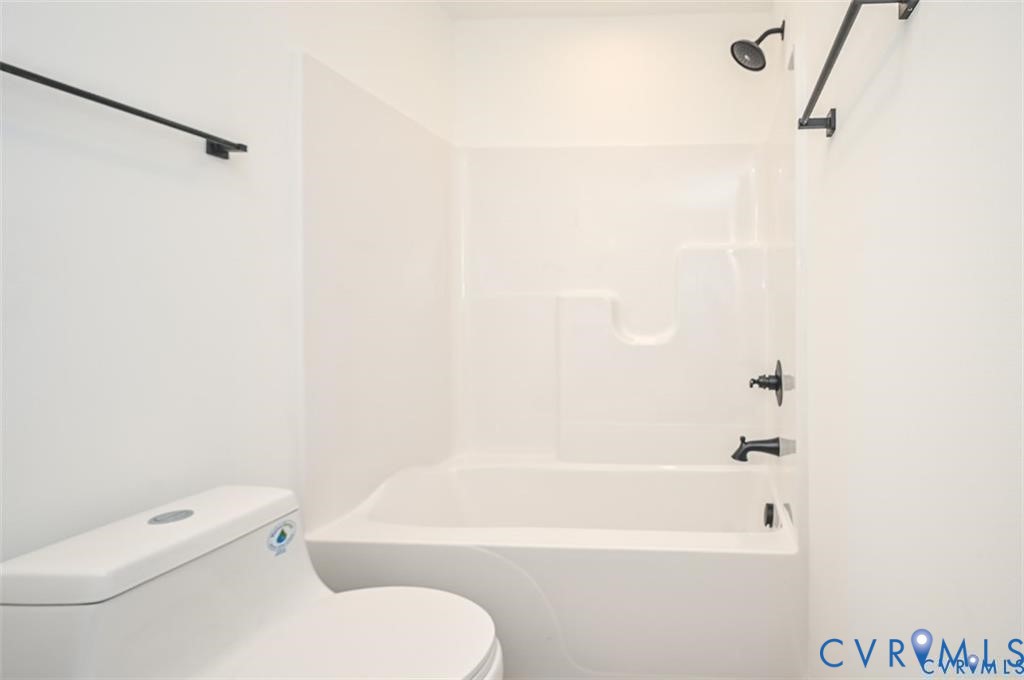 815 Kirby Street West Point, VA 23181 - Photo 22 of 29 a bathroom with a toilet and a bathtub