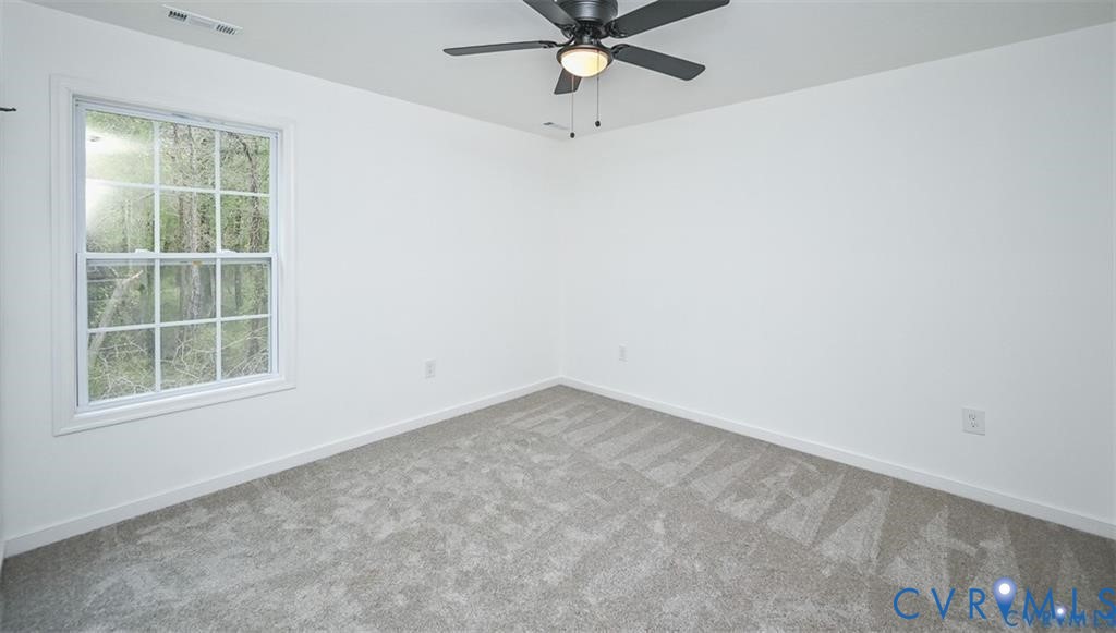 815 Kirby Street West Point, VA 23181 - Photo 25 of 29 an empty room with a window