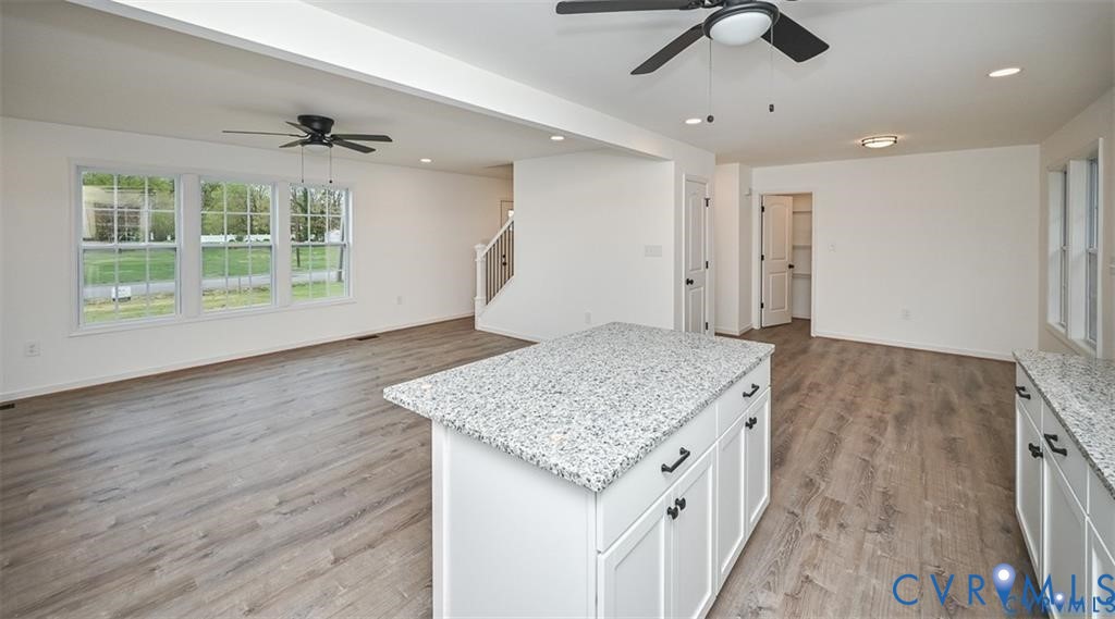 815 Kirby Street West Point, VA 23181 - Photo 10 of 29 a bathroom with a granite countertop sink and a window
