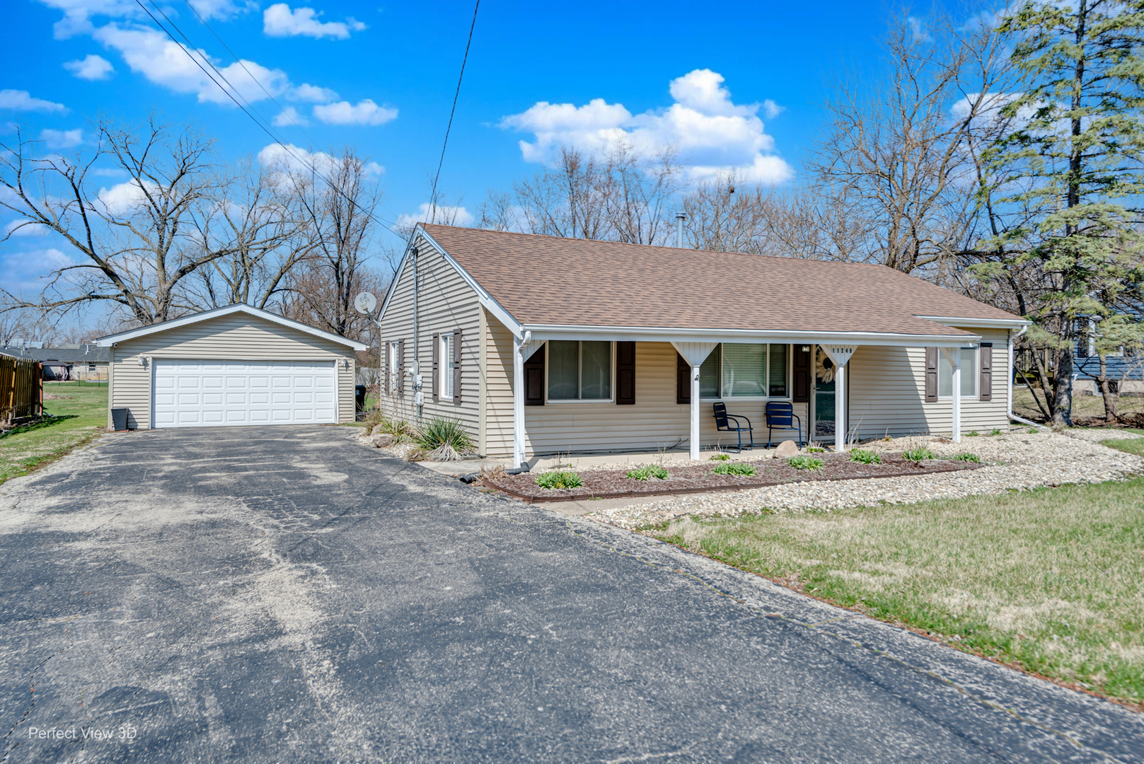 11248 193rd Street Mokena, IL 60448 - Photo 17 of 20 a front view of a house with garden