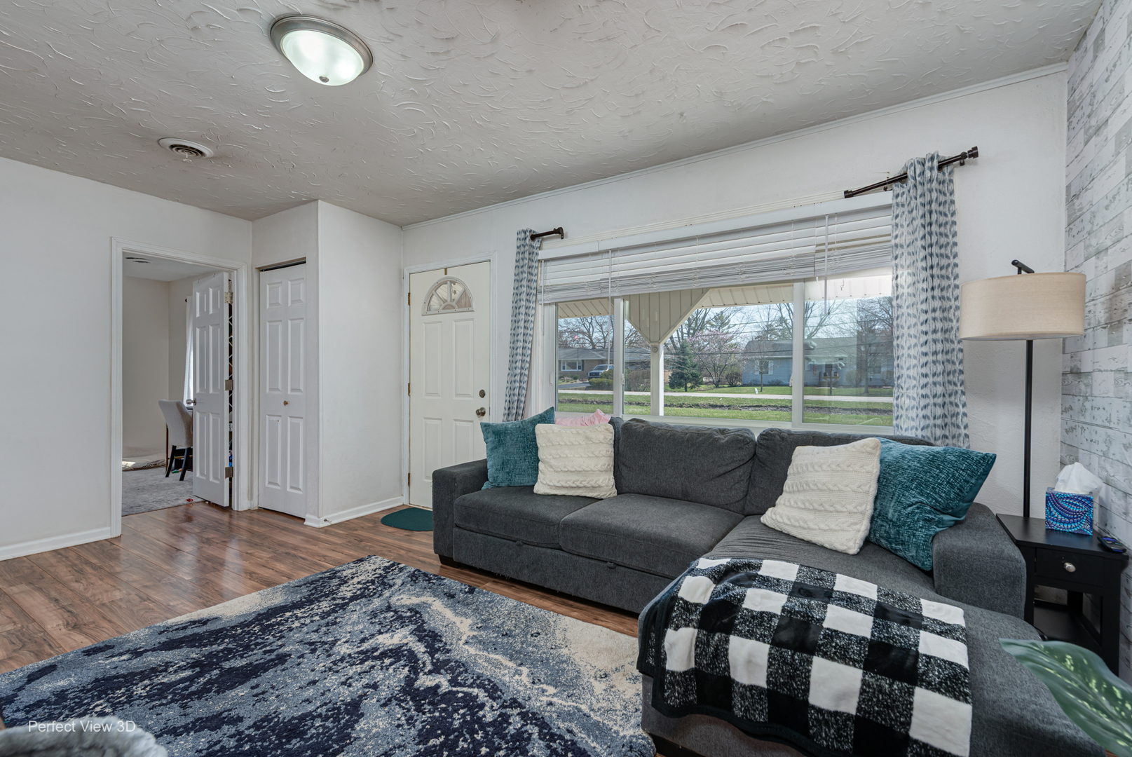 11248 193rd Street Mokena, IL 60448 - Photo 4 of 20 a living room with furniture and a large window