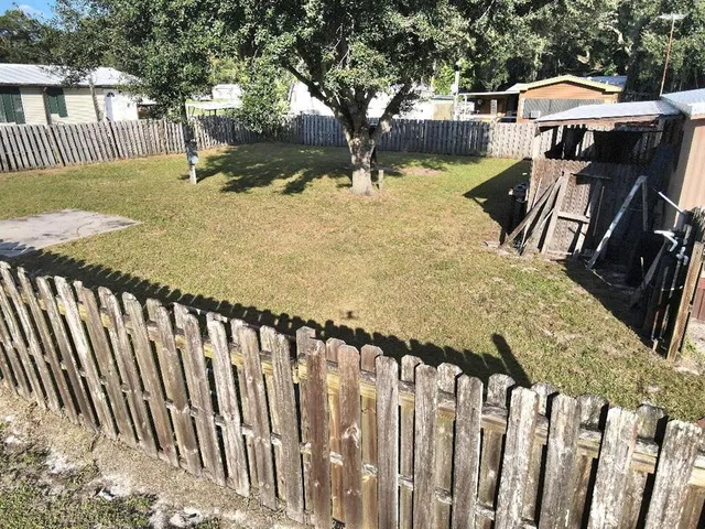 a view of outdoor space and yard