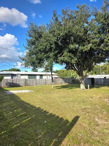 a view of a swimming pool with an outdoor space