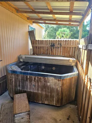 a view of outdoor space with swimming pool and outdoor seating