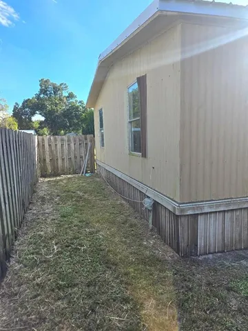 a view of entryway with wooden fence