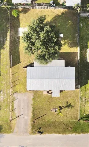 aerial view of residential houses with outdoor space
