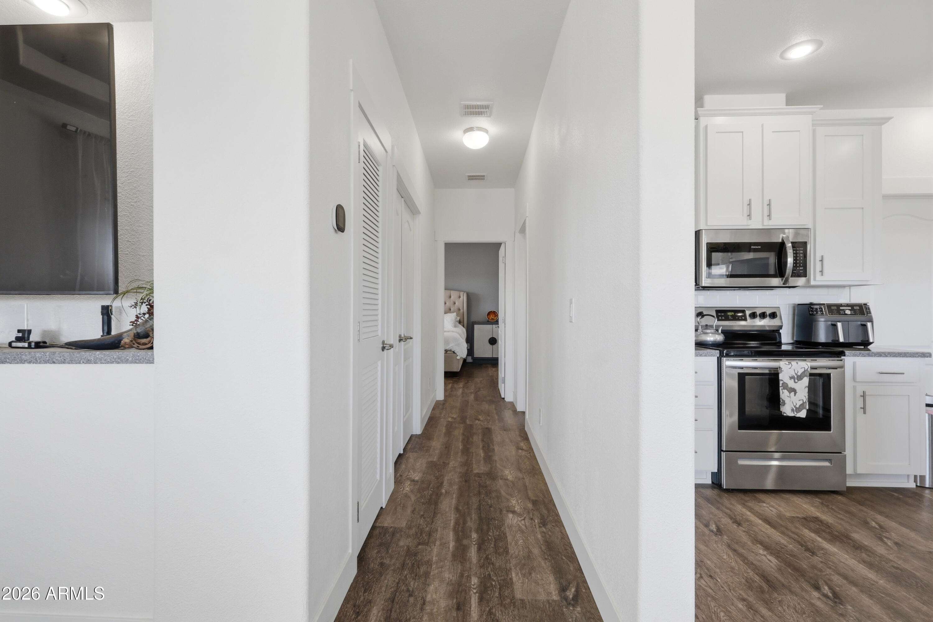 22454 West Steel Horse Road Congress, AZ 85332 - Photo 16 of 44 a view of a kitchen from the hallway