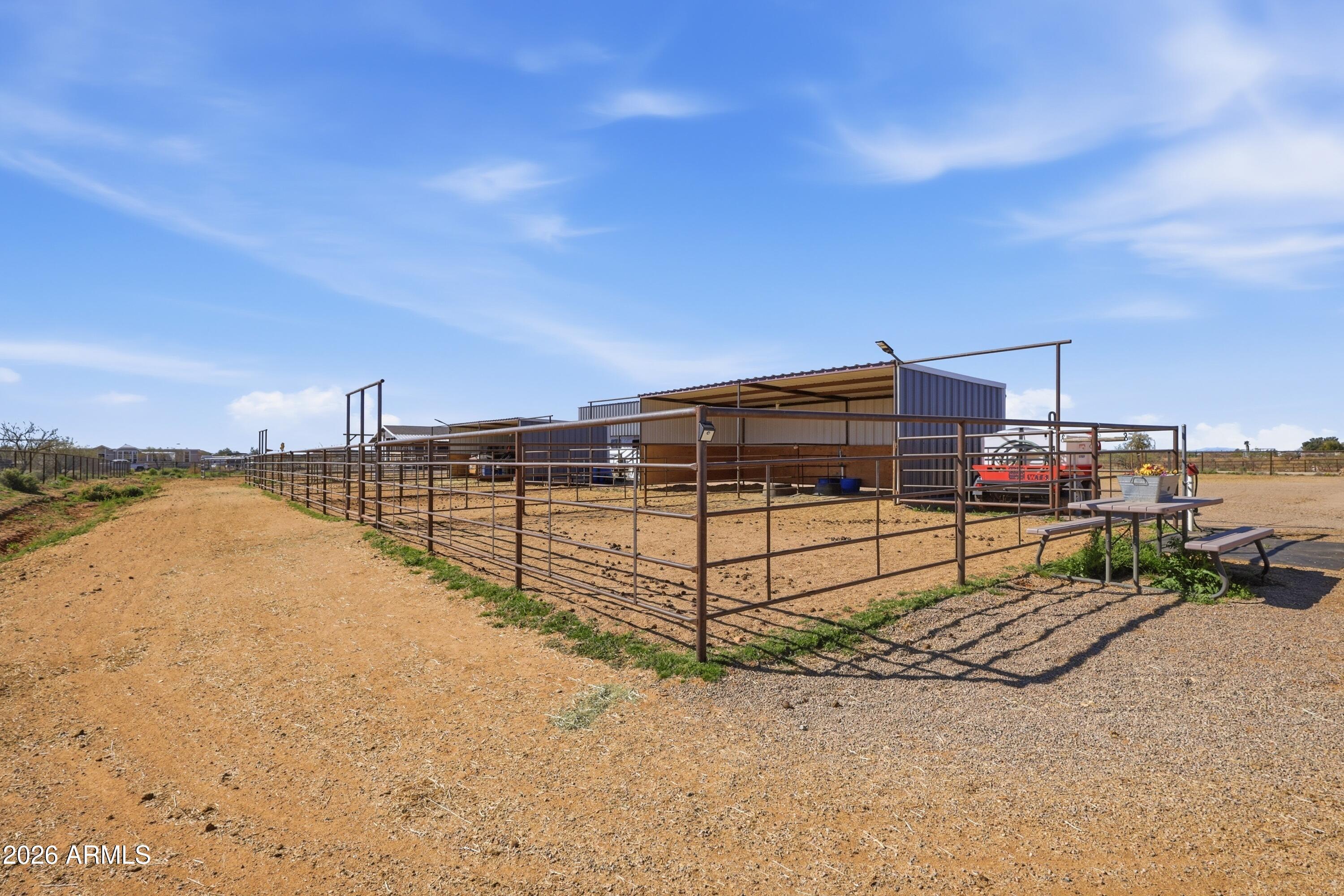 22454 West Steel Horse Road Congress, AZ 85332 - Photo 32 of 44 a view of a terrace with wooden fence