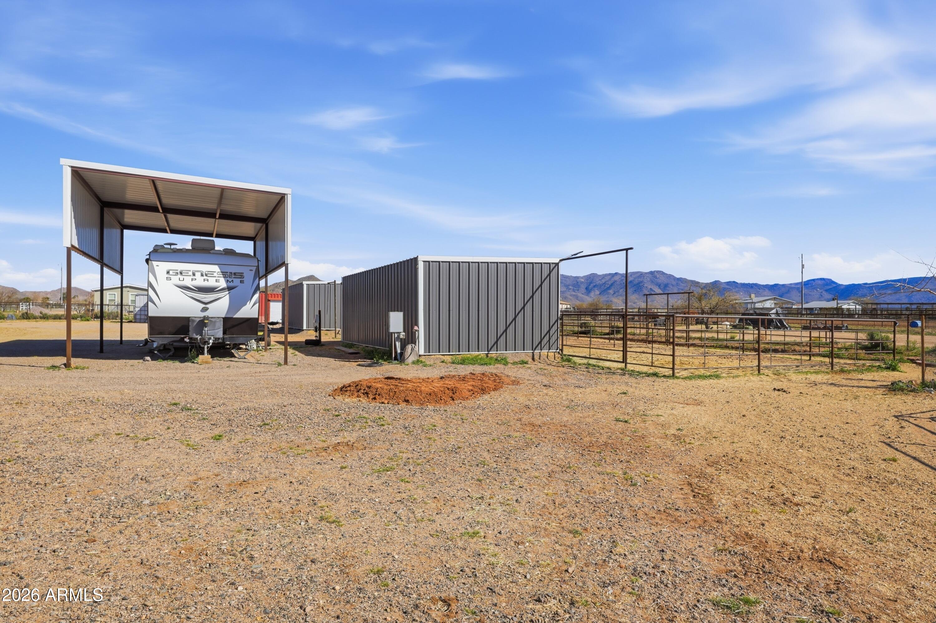 22454 West Steel Horse Road Congress, AZ 85332 - Photo 37 of 44 a view of a house with a yard