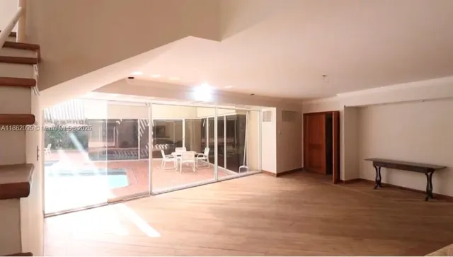 a view of furniture in middle of room