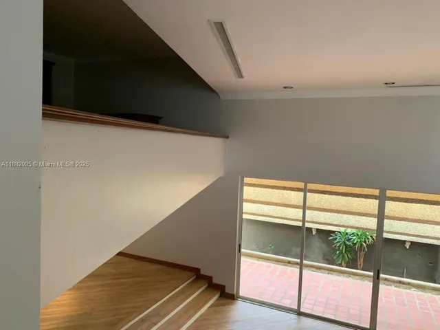 a view of a livingroom with furniture
