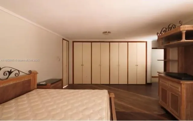 a bathroom with a sink a toilet a mirror and vanity