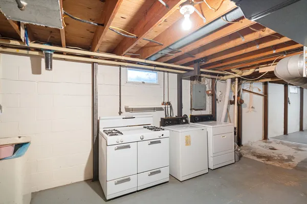 a view of a kitchen with appliances and cabinets