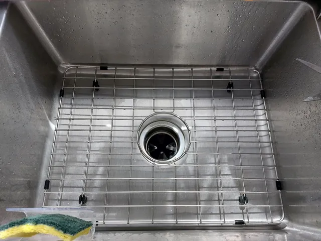 a close view of a sink in bathroom