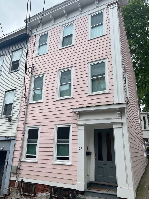26 Eden Street, Unit 1 Boston, MA 02129 - Photo 2 of 23 a view of a house with more windows and deck