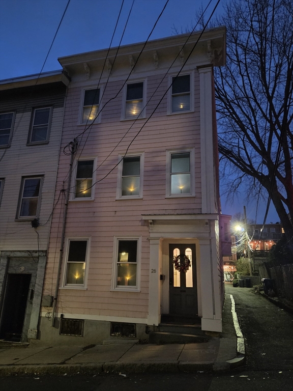 26 Eden Street, Unit 1 Boston, MA 02129 - Photo 22 of 23 a front view of a house with yard