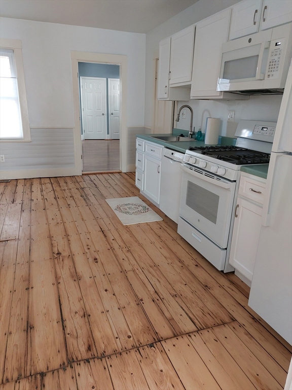 26 Eden Street, Unit 1 Boston, MA 02129 - Photo 4 of 23 a kitchen with a sink and cabinets