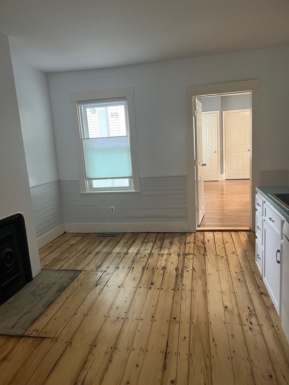 26 Eden Street, Unit 1 Boston, MA 02129 - Photo 6 of 23 a view of an empty room and wooden floor