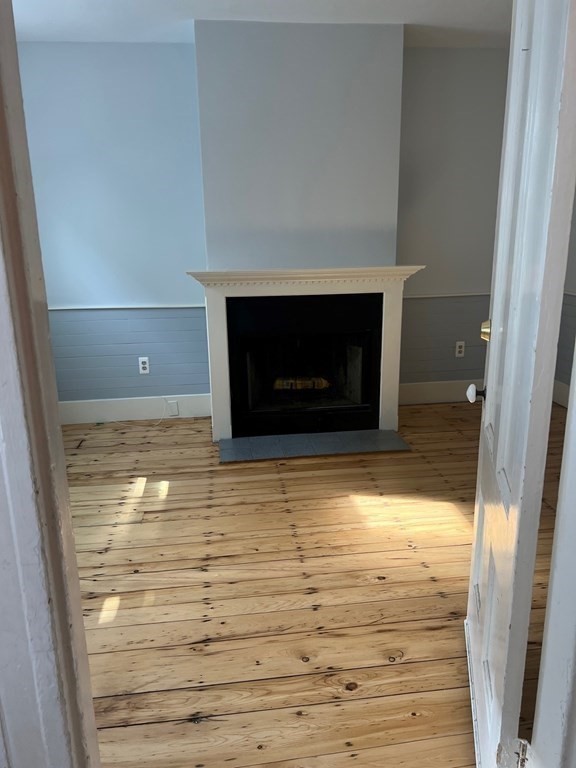 26 Eden Street, Unit 1 Boston, MA 02129 - Photo 8 of 23 a view of empty room with wooden floor