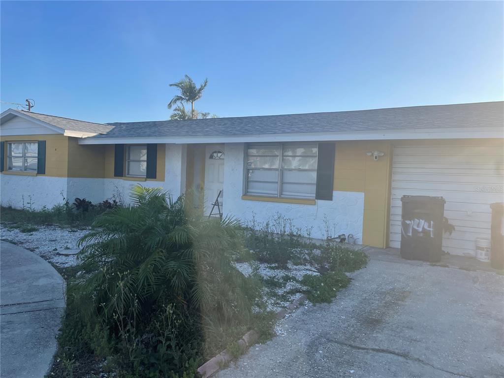 744 Gran Kaymen Way Apollo Beach, FL 33572 - Photo 3 of 12 a front view of a house with yard