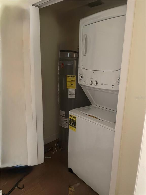 744 Gran Kaymen Way Apollo Beach, FL 33572 - Photo 7 of 12 a utility room with dryer and washer