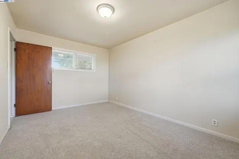 a view of a house with a big yard