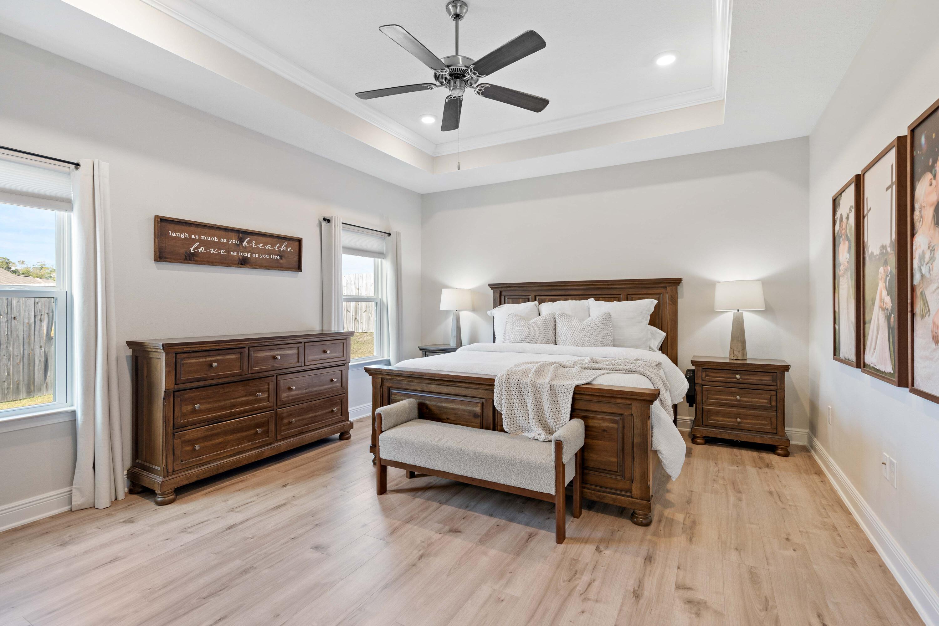 58 Siesta Circle Freeport, FL 32439 - Photo 20 of 40 a bedroom with a bed and a flat screen tv