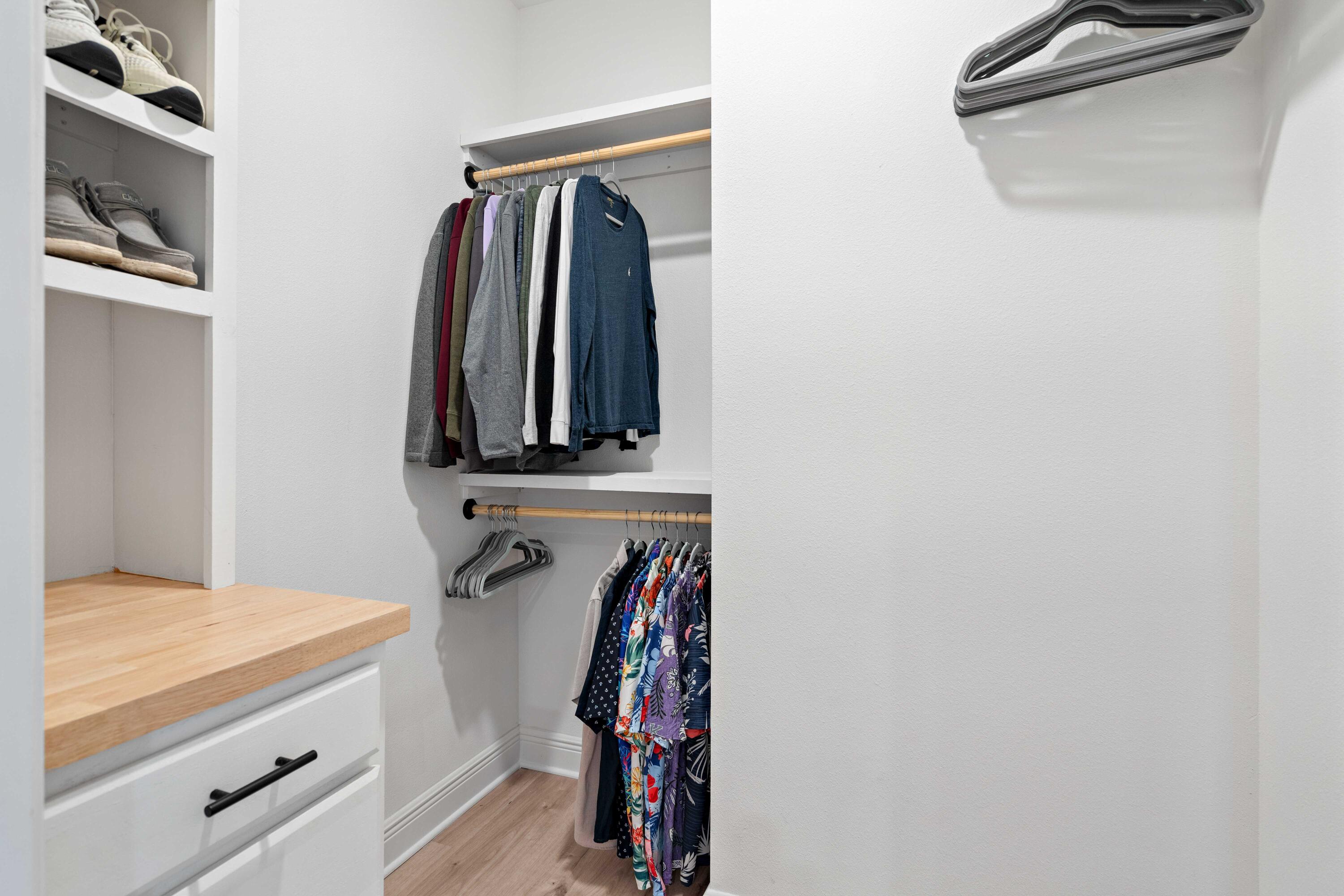 58 Siesta Circle Freeport, FL 32439 - Photo 25 of 40 a view of walk in closet with clothes