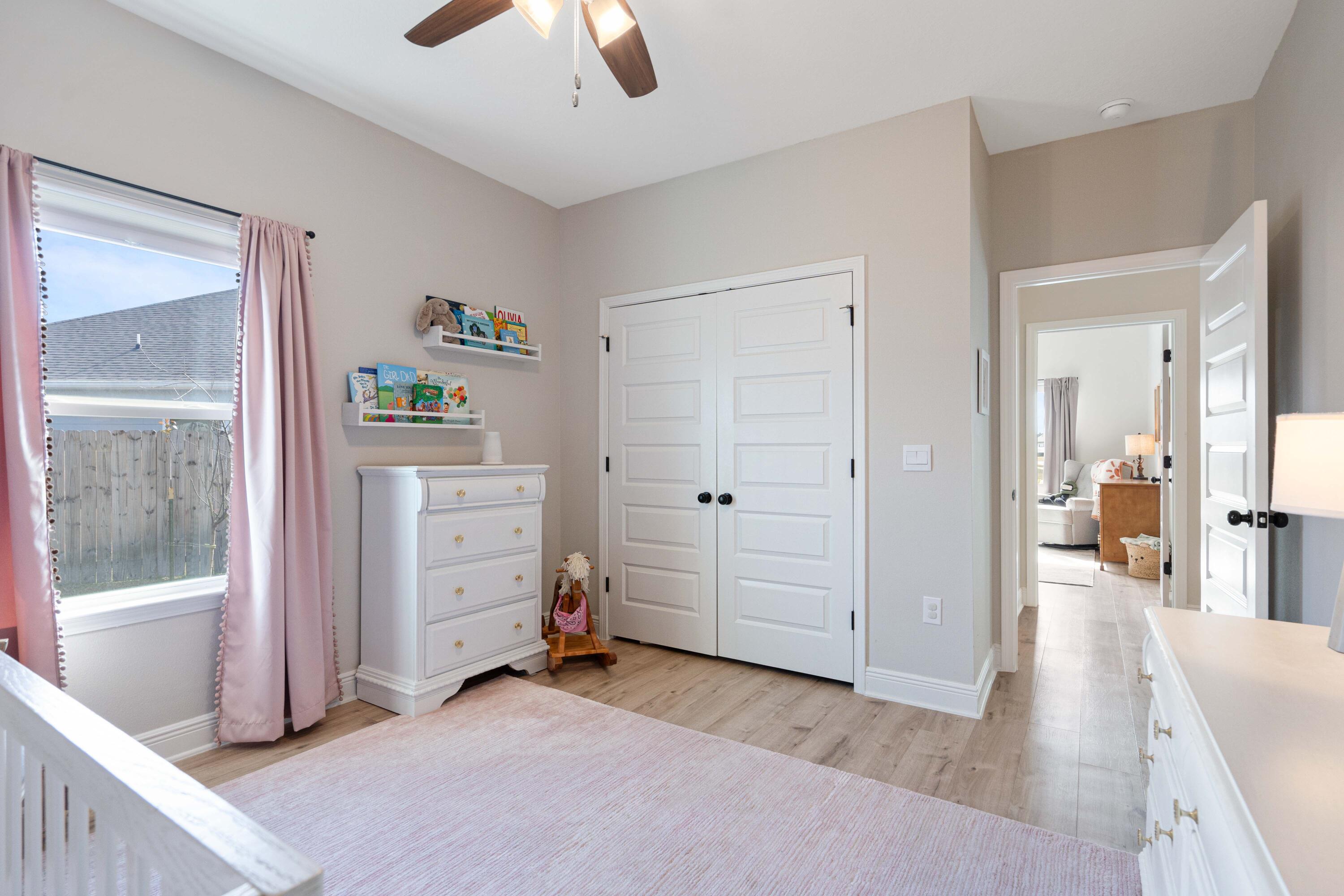 58 Siesta Circle Freeport, FL 32439 - Photo 28 of 40 a view of a bedroom with closet and cabinet