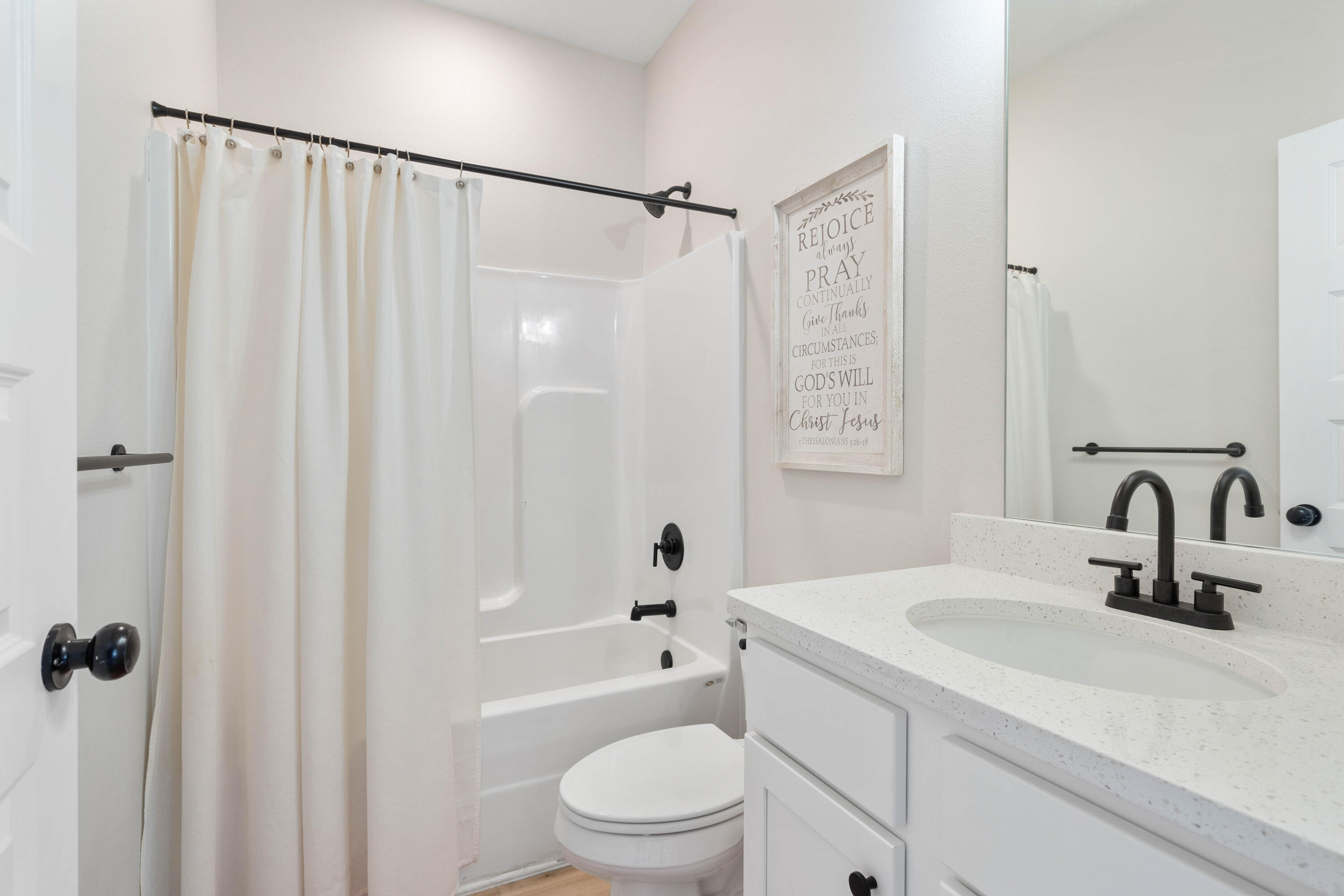 58 Siesta Circle Freeport, FL 32439 - Photo 29 of 40 a bathroom with a sink a toilet and shower