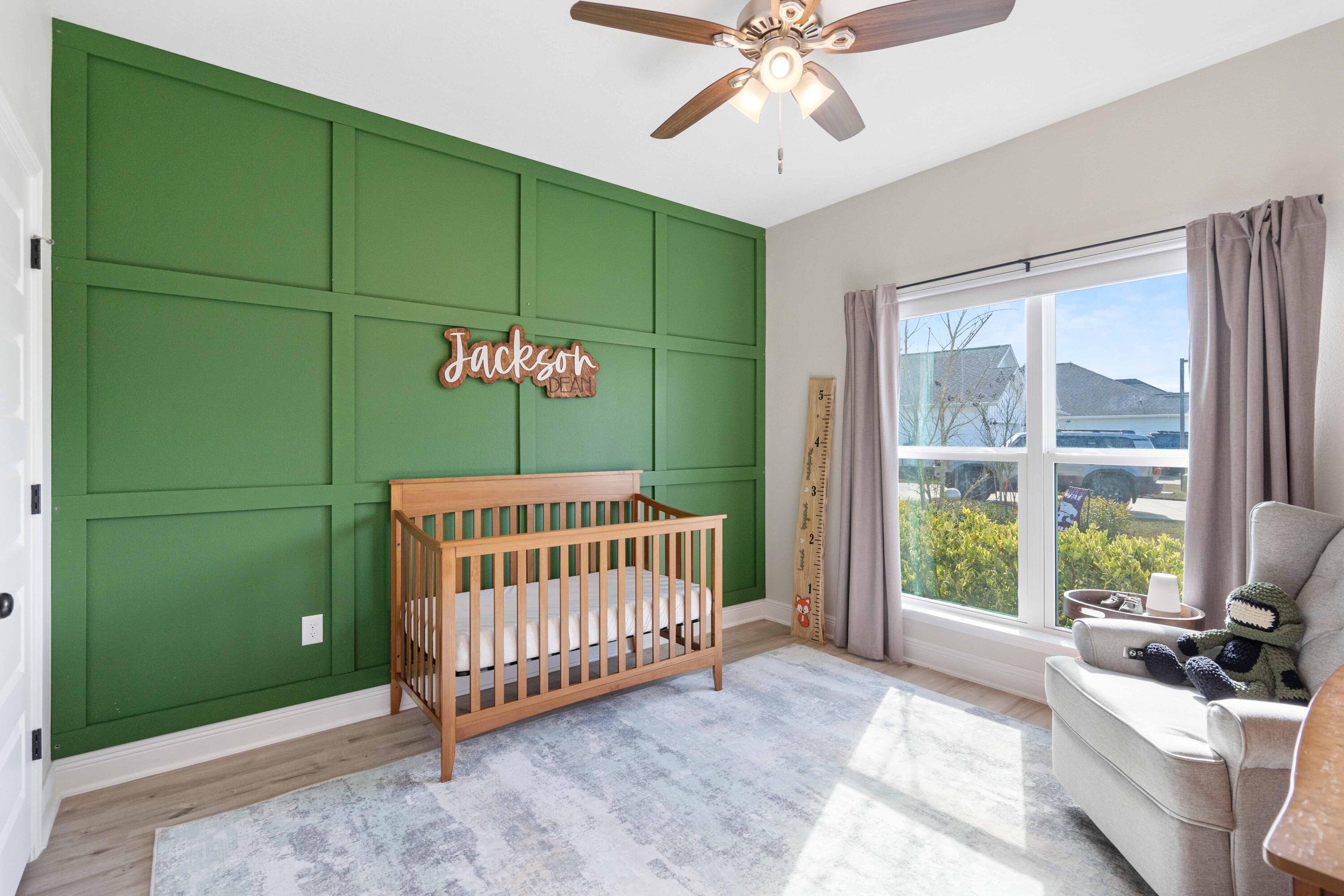 58 Siesta Circle Freeport, FL 32439 - Photo 30 of 40 a bedroom with a bed and a chandelier