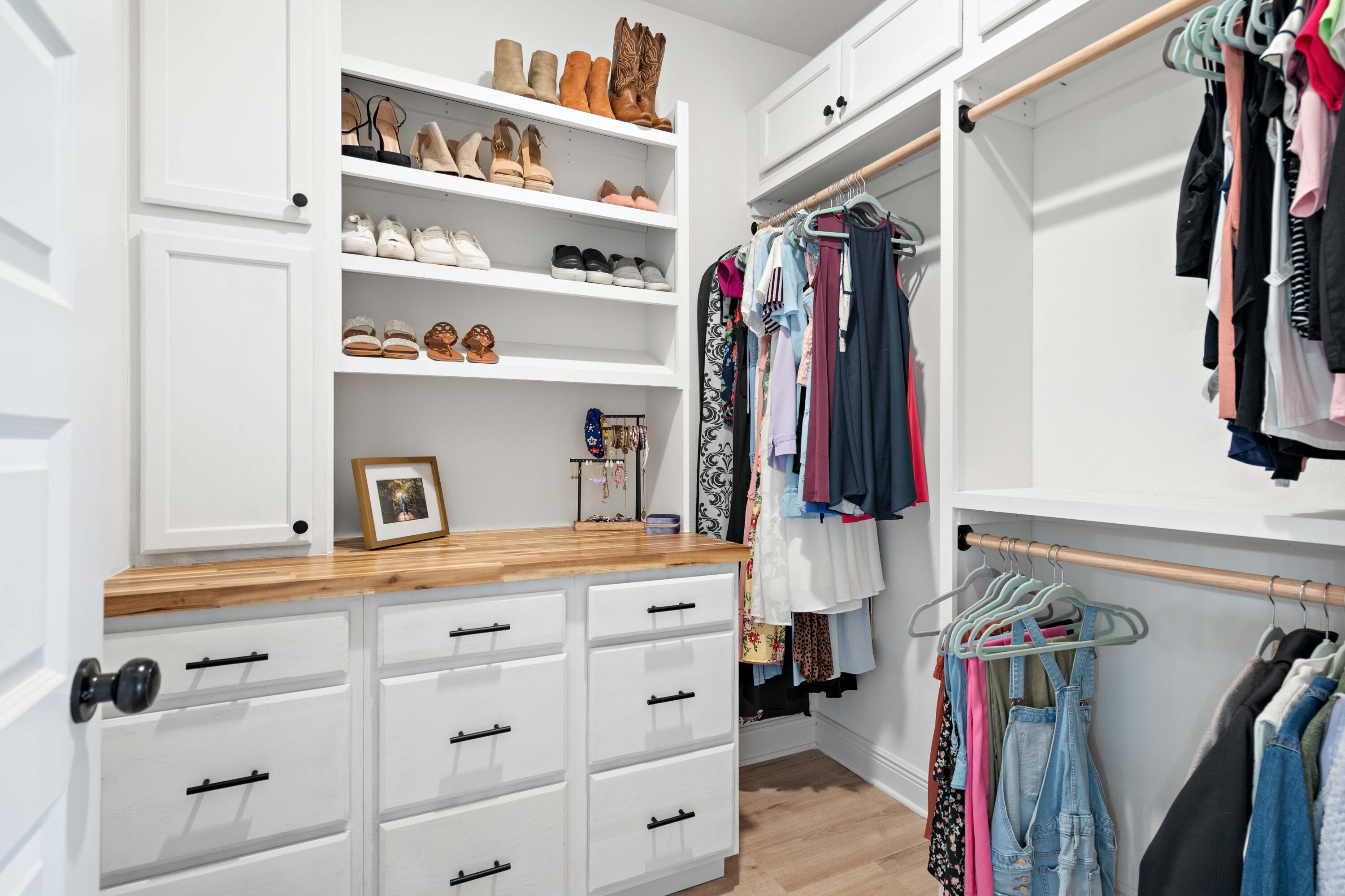 58 Siesta Circle Freeport, FL 32439 - Photo 30 of 45 a view of walk in closet with clothes and shoes