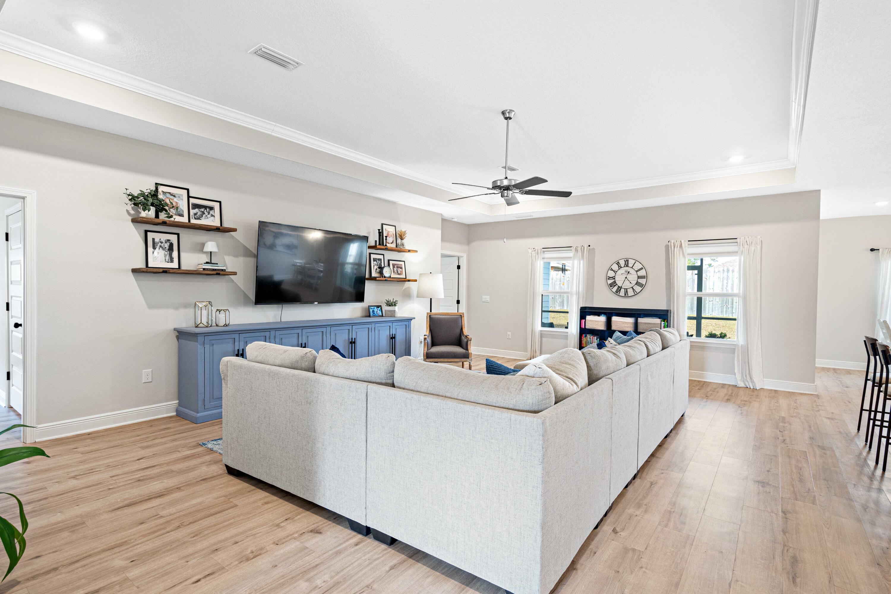 58 Siesta Circle Freeport, FL 32439 - Photo 4 of 40 a living room with furniture and a flat screen tv