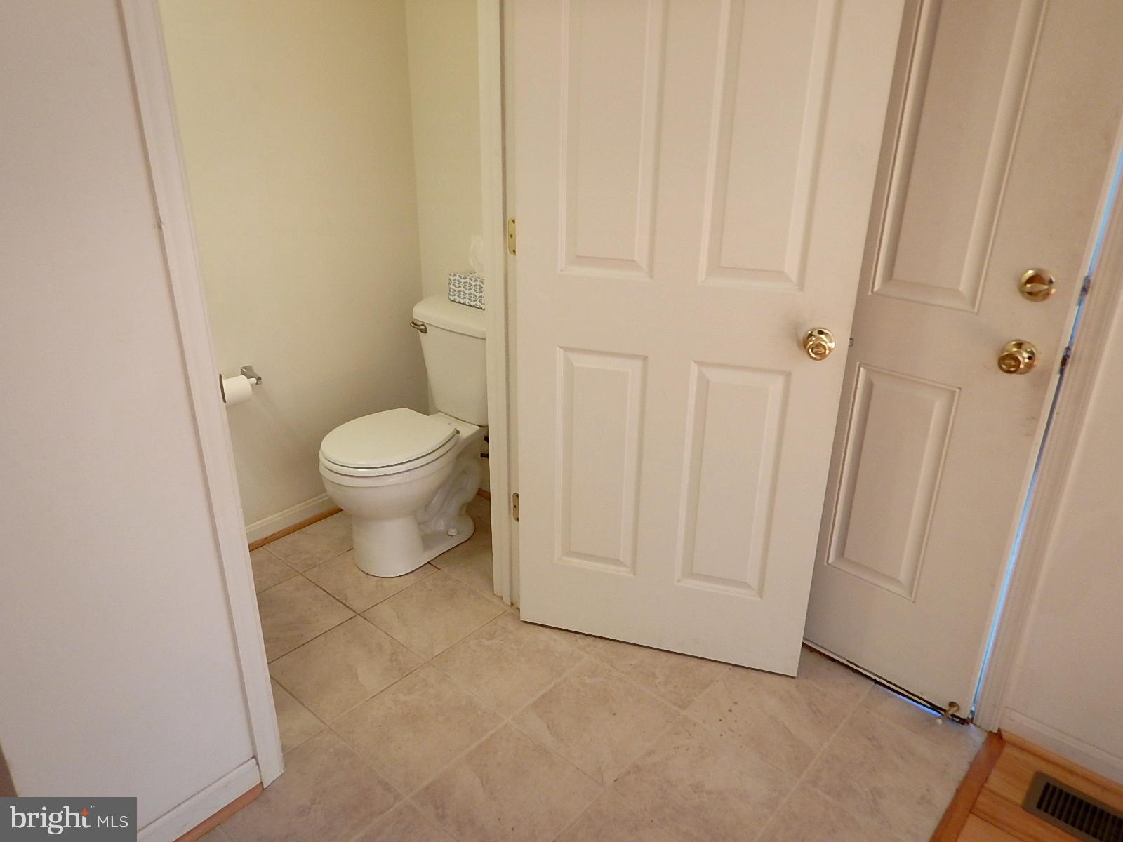 6005 York Road Baltimore, MD 21212 - Photo 12 of 31 Powder Room is on the right as you enter the home