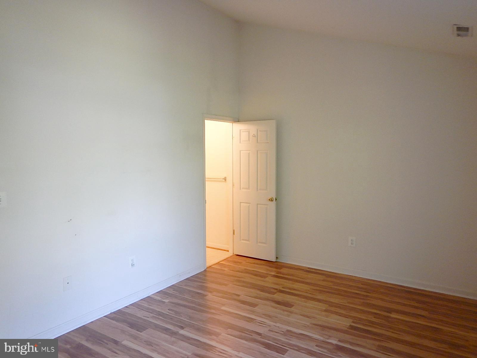6005 York Road Baltimore, MD 21212 - Photo 16 of 31 Primary Bedroom with vaulted ceiling, bath to left