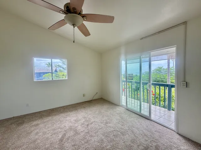 view of living room with furniture and stairs
