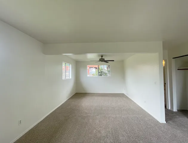 an empty room with windows