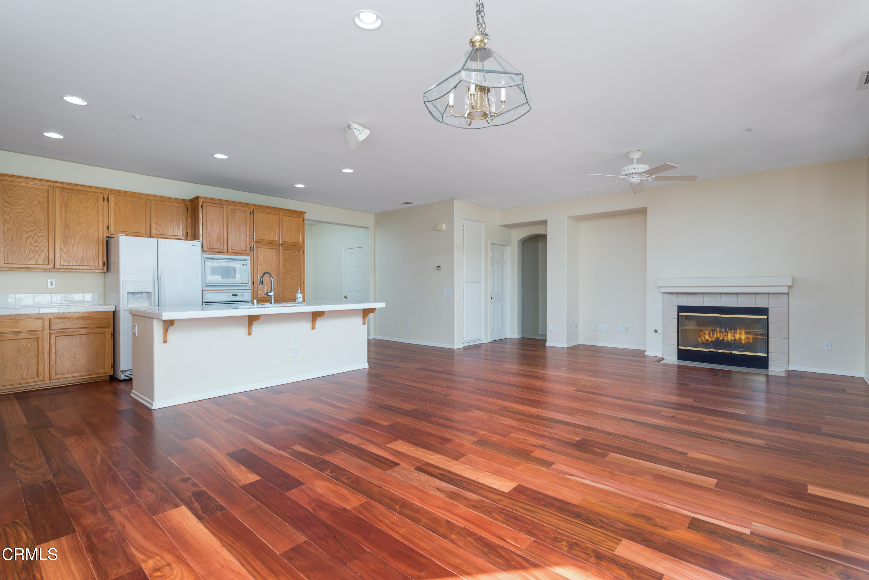 810 Rosalinda Drive Oxnard, CA 93030 - Photo 12 of 24 a view of kitchen and kitchen with wooden floor