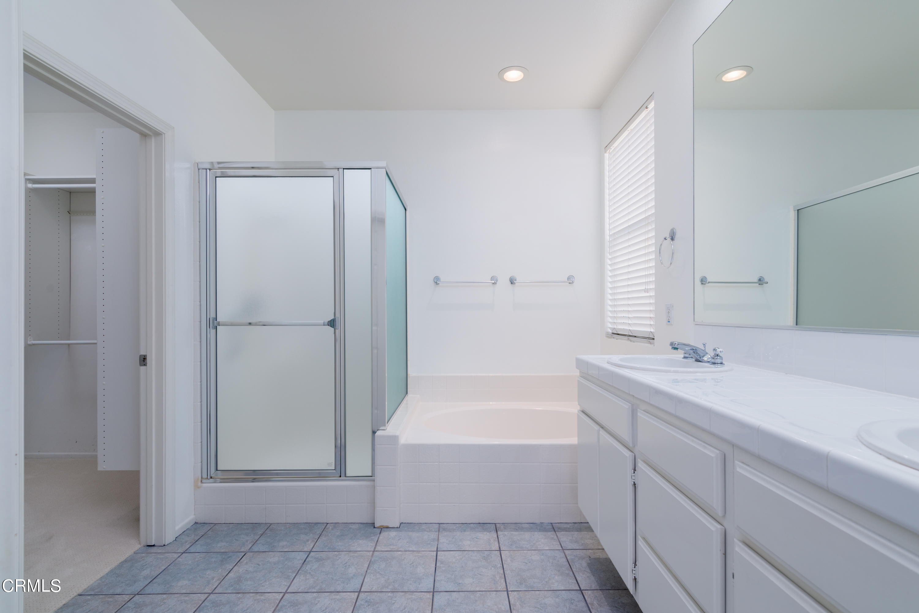 810 Rosalinda Drive Oxnard, CA 93030 - Photo 20 of 24 a bathroom with a bathtub and a sink