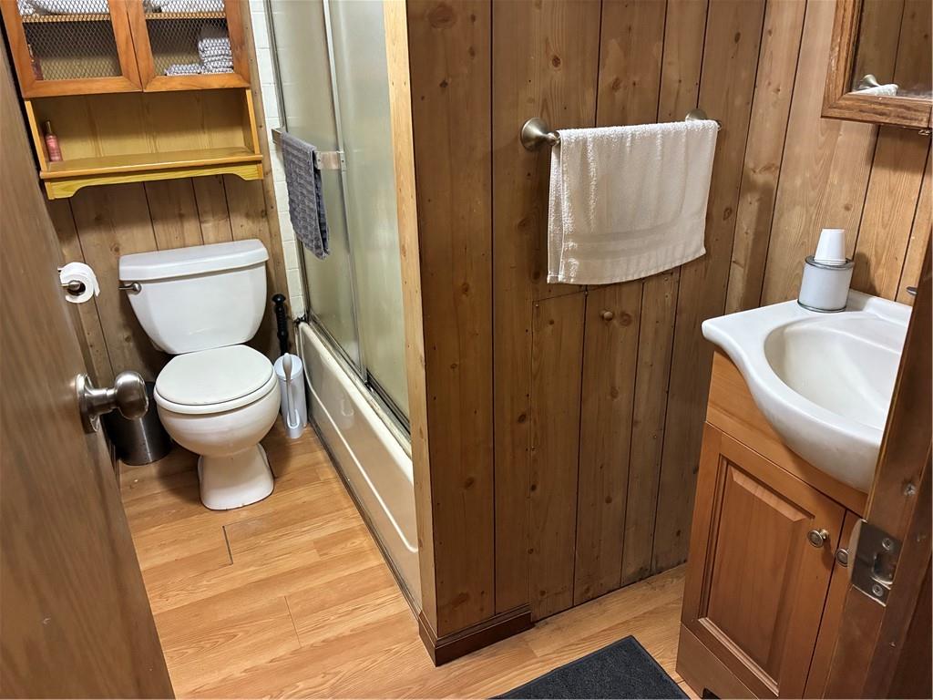 244 Manors Mill Road Dallas, GA 30157 - Photo 14 of 39 a white toilet sitting next to a bathroom sink