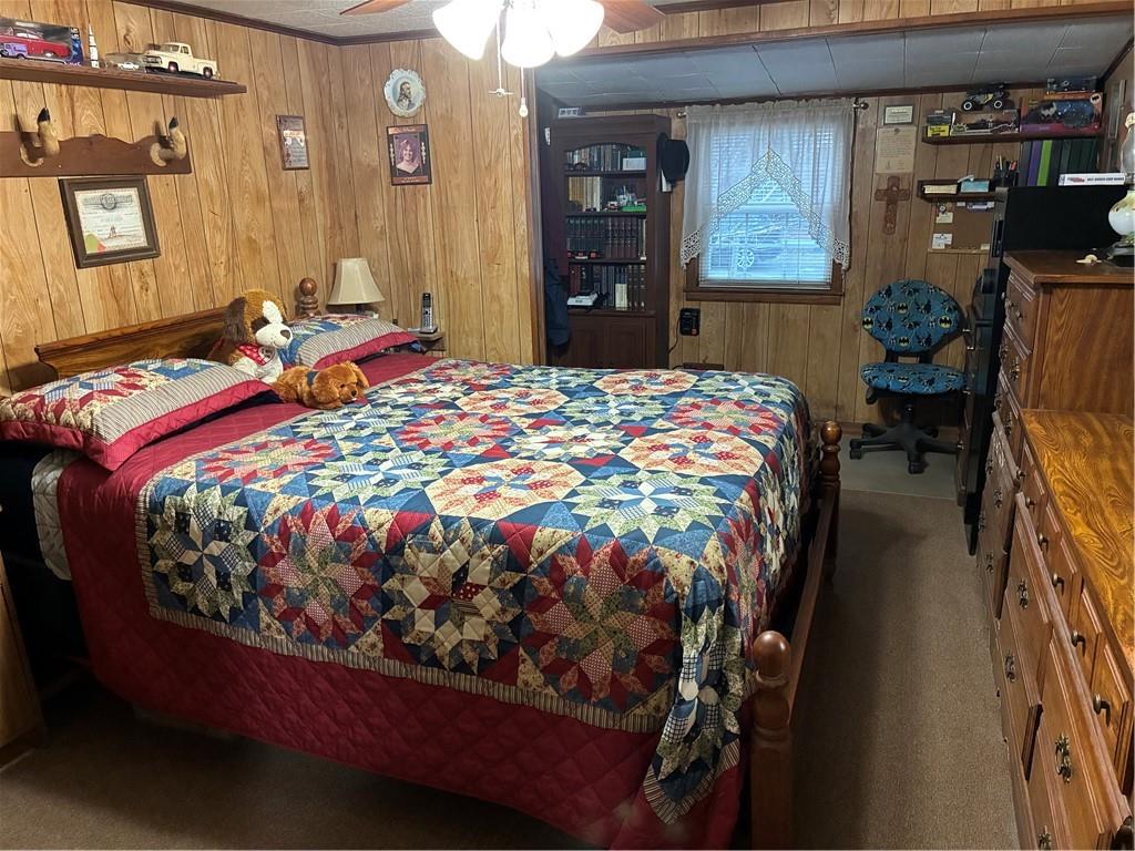 244 Manors Mill Road Dallas, GA 30157 - Photo 16 of 39 a bedroom with bed and window