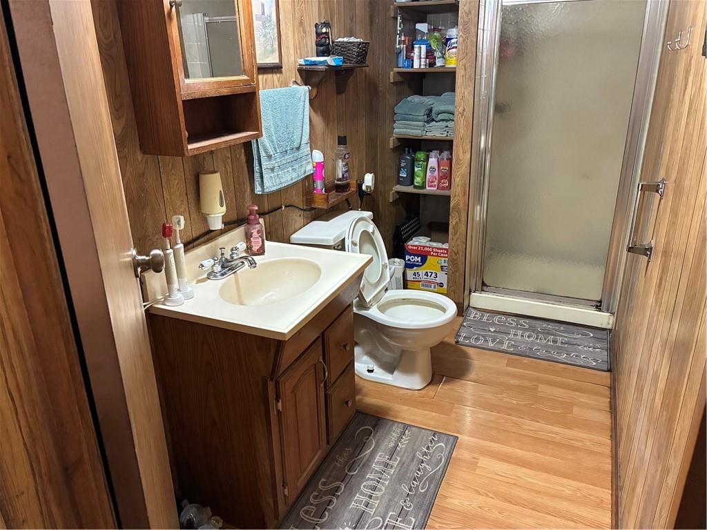 244 Manors Mill Road Dallas, GA 30157 - Photo 17 of 39 a bathroom with a sink toilet and shower