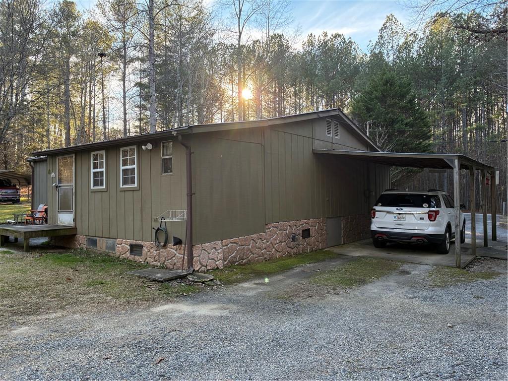 244 Manors Mill Road Dallas, GA 30157 - Photo 20 of 39 a view of a house with a back yard
