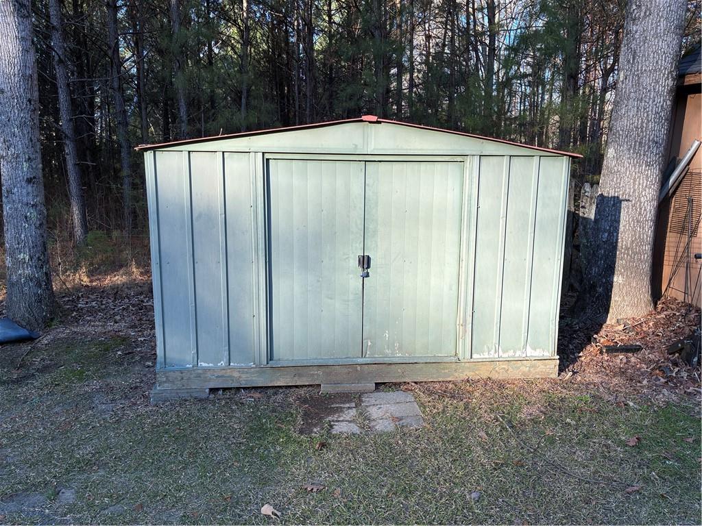 244 Manors Mill Road Dallas, GA 30157 - Photo 26 of 39 a backyard of a house